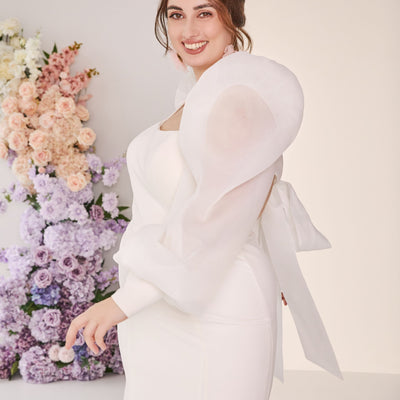 Fit-n-flare wedding dress with with organza bubble sleeves.