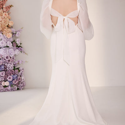 Fit-n-flare wedding dress with with organza bubble sleeves.