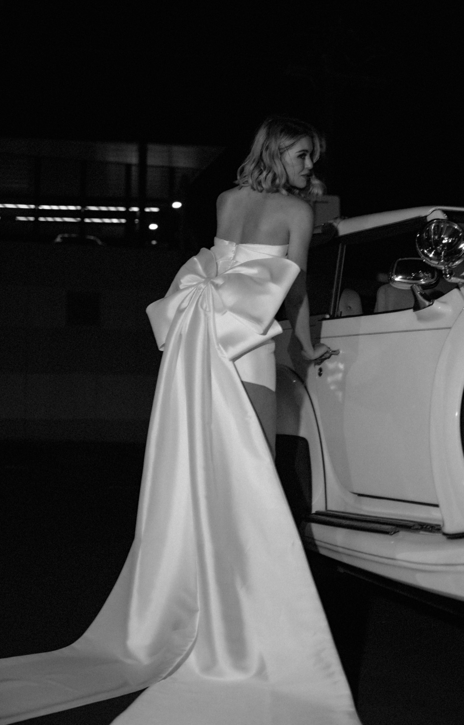 Fitted, strapless mini bridal dress in Mikado fabric 