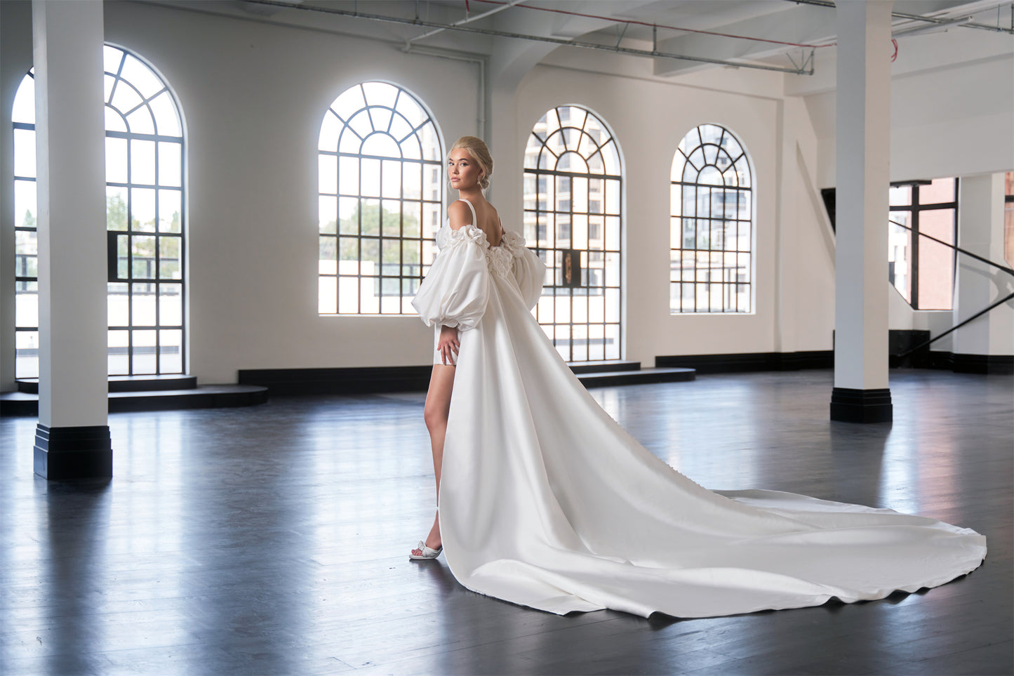 Fitted mini bridal dress with square neckline and boning