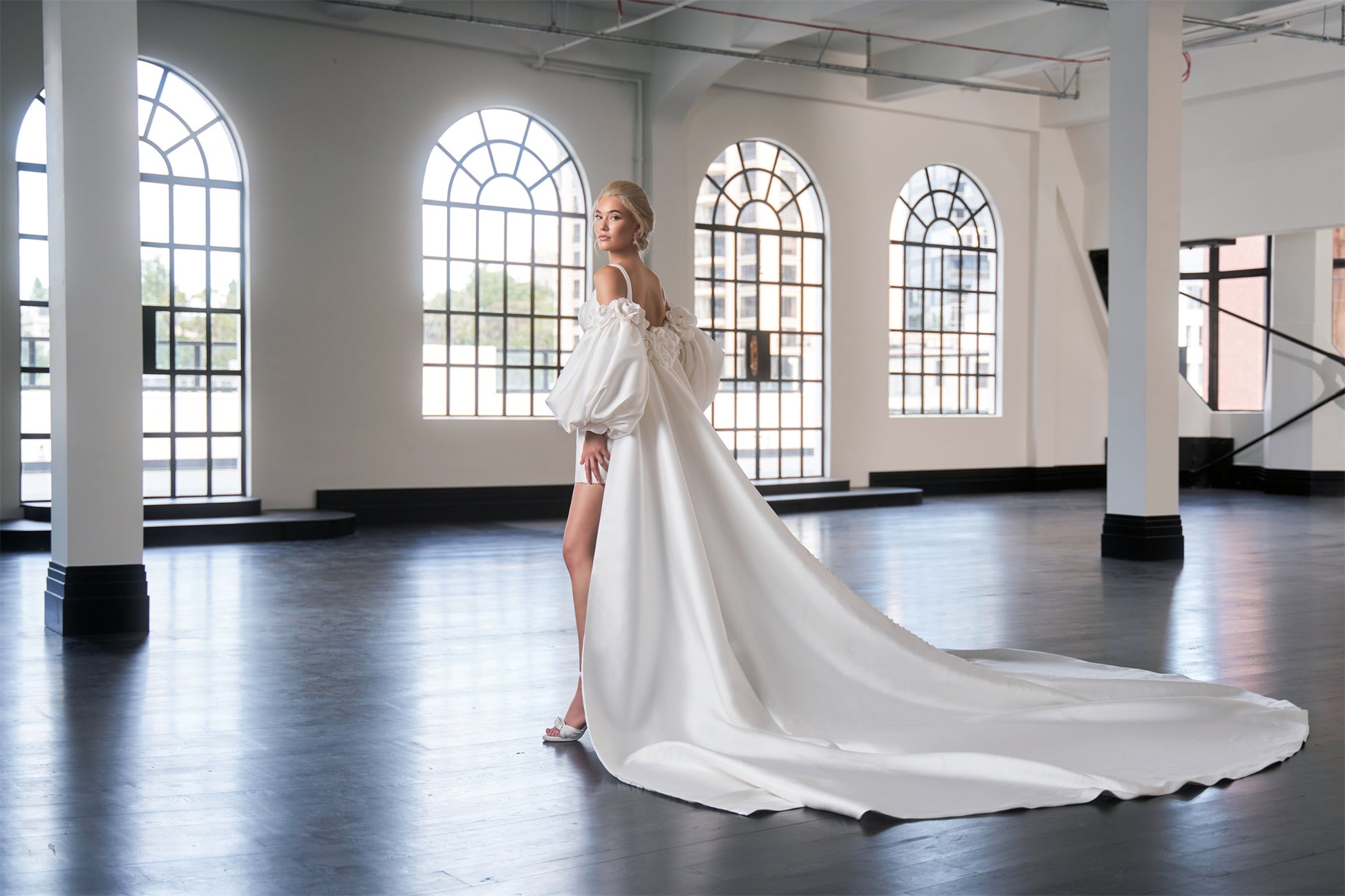 Fitted mini bridal dress with square neckline and boning