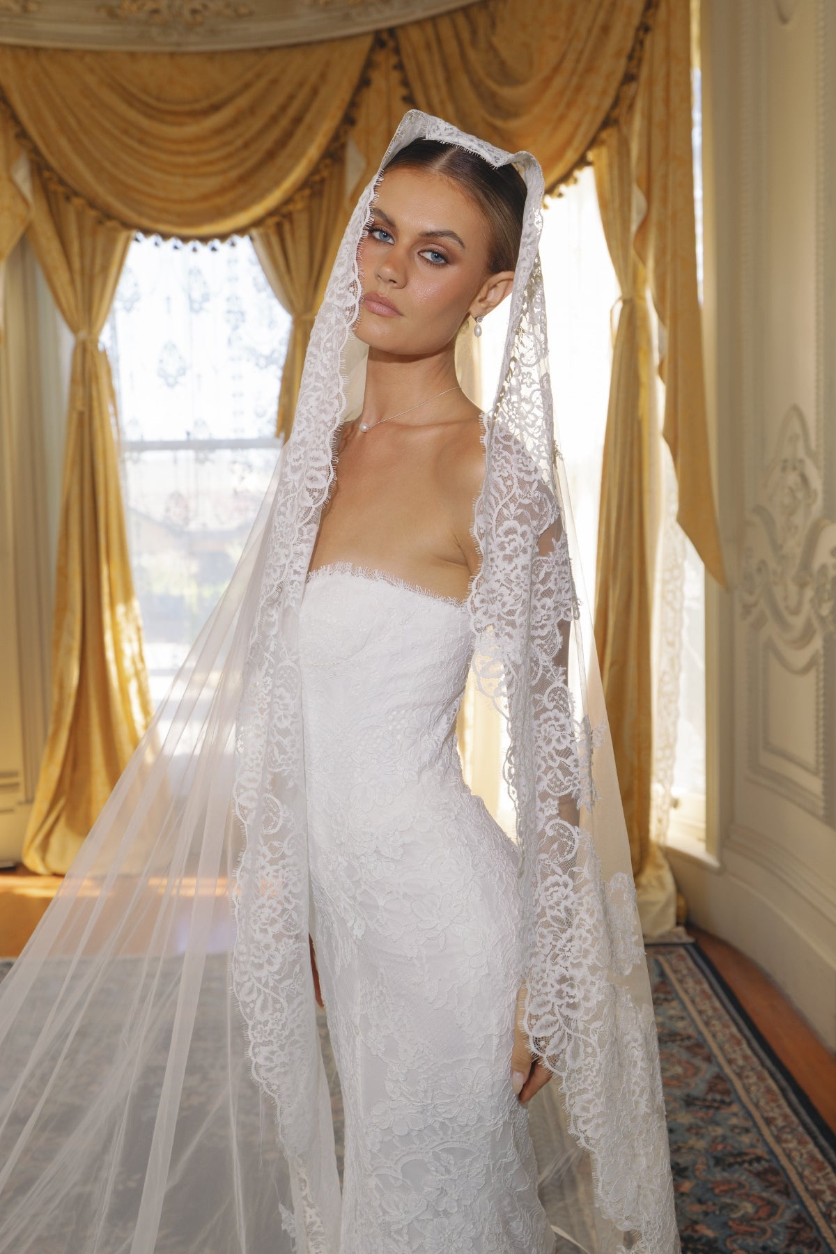 126 inch Mantilla style Cathedral length, single tier Lace veil.