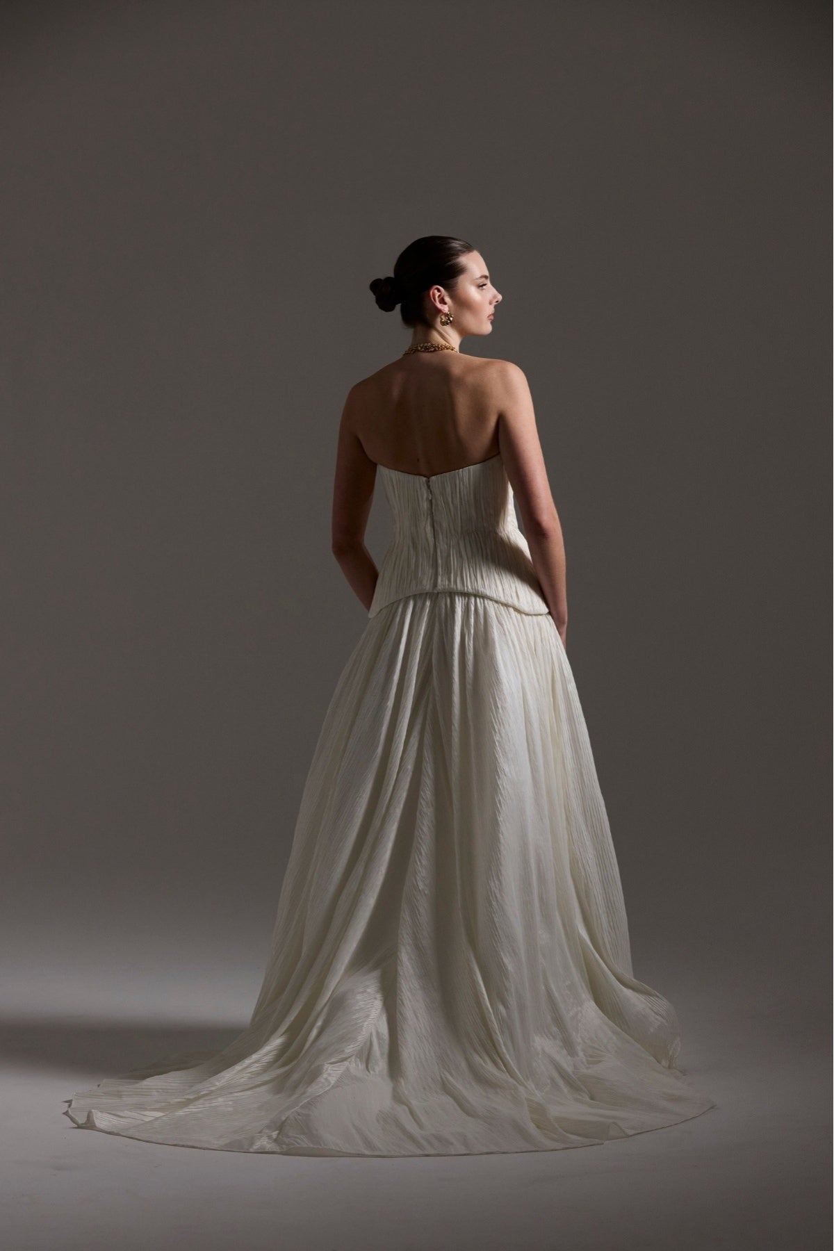 two-piece pleated taffeta wedding gown featuring a sweetheart neckline with a drop waist, A-line skirt. 