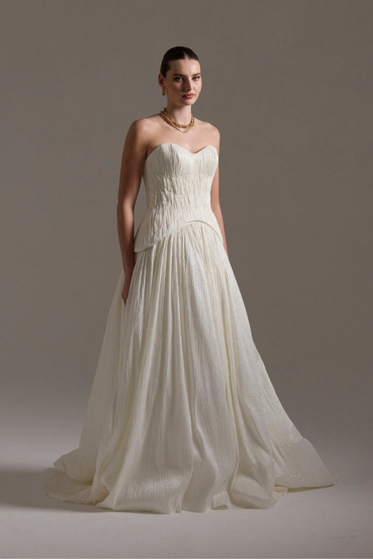 two-piece pleated taffeta wedding gown featuring a sweetheart neckline with a drop waist, A-line skirt. 