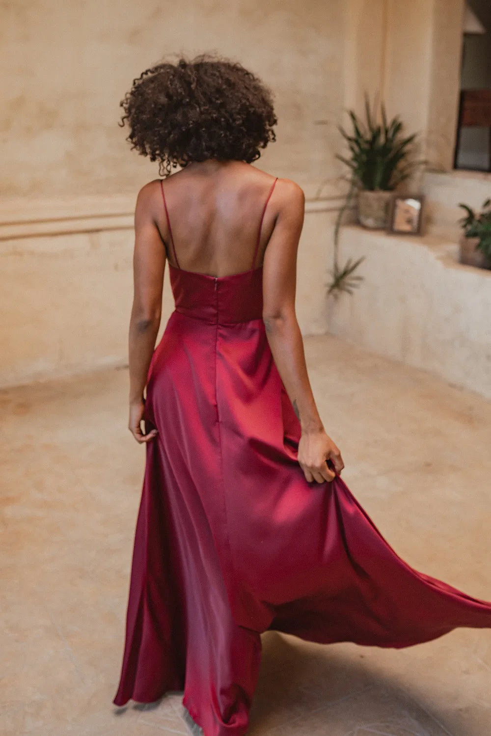 Back view of Denver bridesmaid dress with shoestring straps. A-line skirt with centre back zip running from top of bodice.