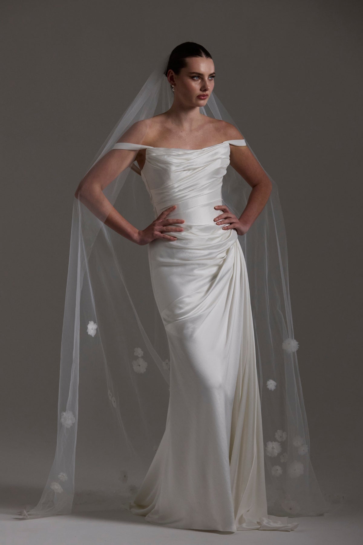 Tulle bridal Veil with 3D flowers trailing behind 