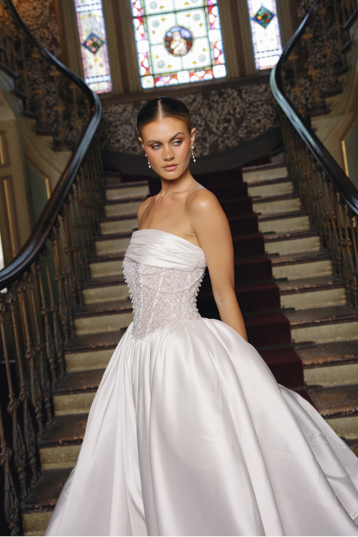 strapless A-line wedding gown with beaded pearl and crystal bodice, mikado fabric. 