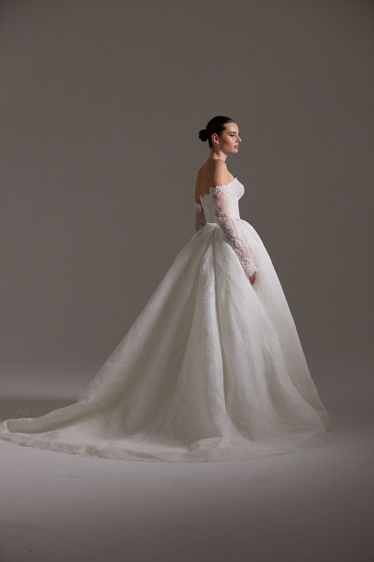 A line ballgown wedding dress with sweetheart neckline,  and deep basque waistline in chantilly lace 