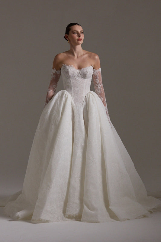 A line ballgown wedding dress with sweetheart neckline,  and deep basque waistline in chantilly lace 