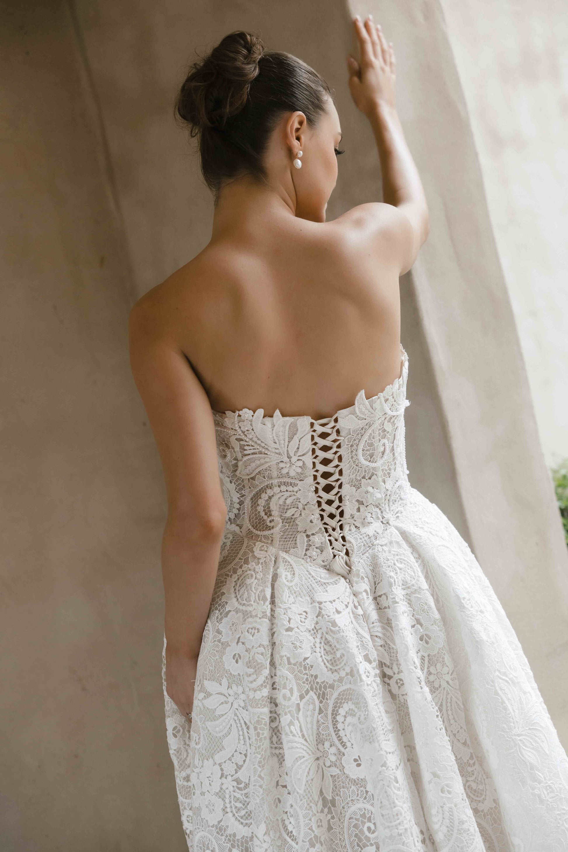 Vogue Gown – Full lace A-line ballgown with a cat-eye corseted bodice and subtle boning. By Roselle Collection, Jessica Couture.