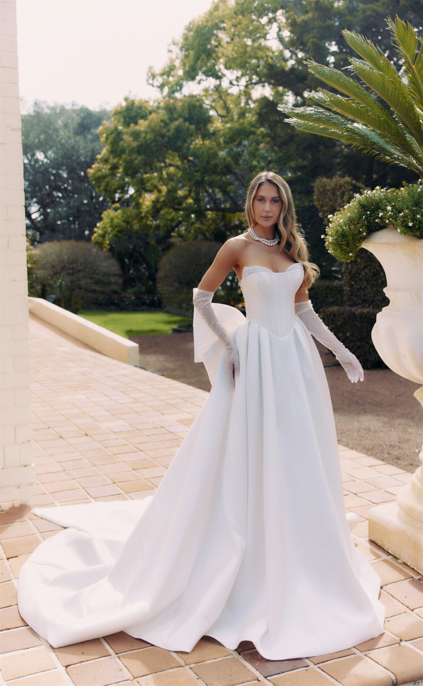 YVONNE Bridal Gown - Wedding dress by Victoria Collection Jessica Couture. Featuring an A-line Mikado gown with chapel train, and pearl encrusted cups in a Corseted bodice. 
