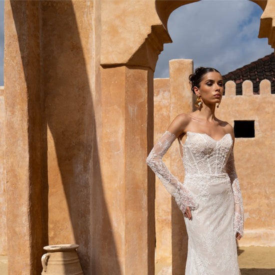 fitted lace wedding gown, with detachable fitted sleeves. 