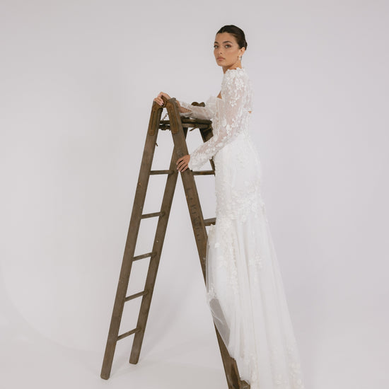 lace mermaid wedding gown, strapless sweetheart bodice with lace bolero jacket on top. 