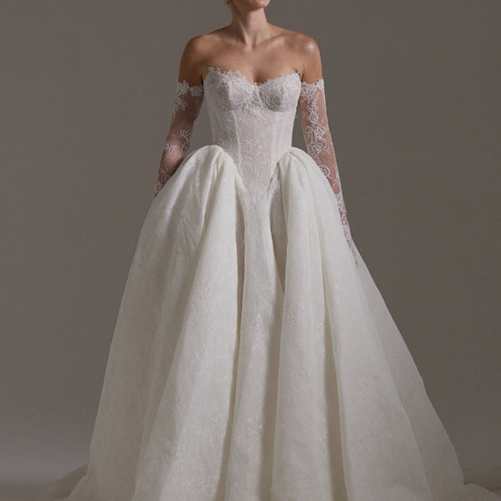 A line ballgown wedding dress with sweetheart neckline,  and deep basque waistline in chantilly lace 