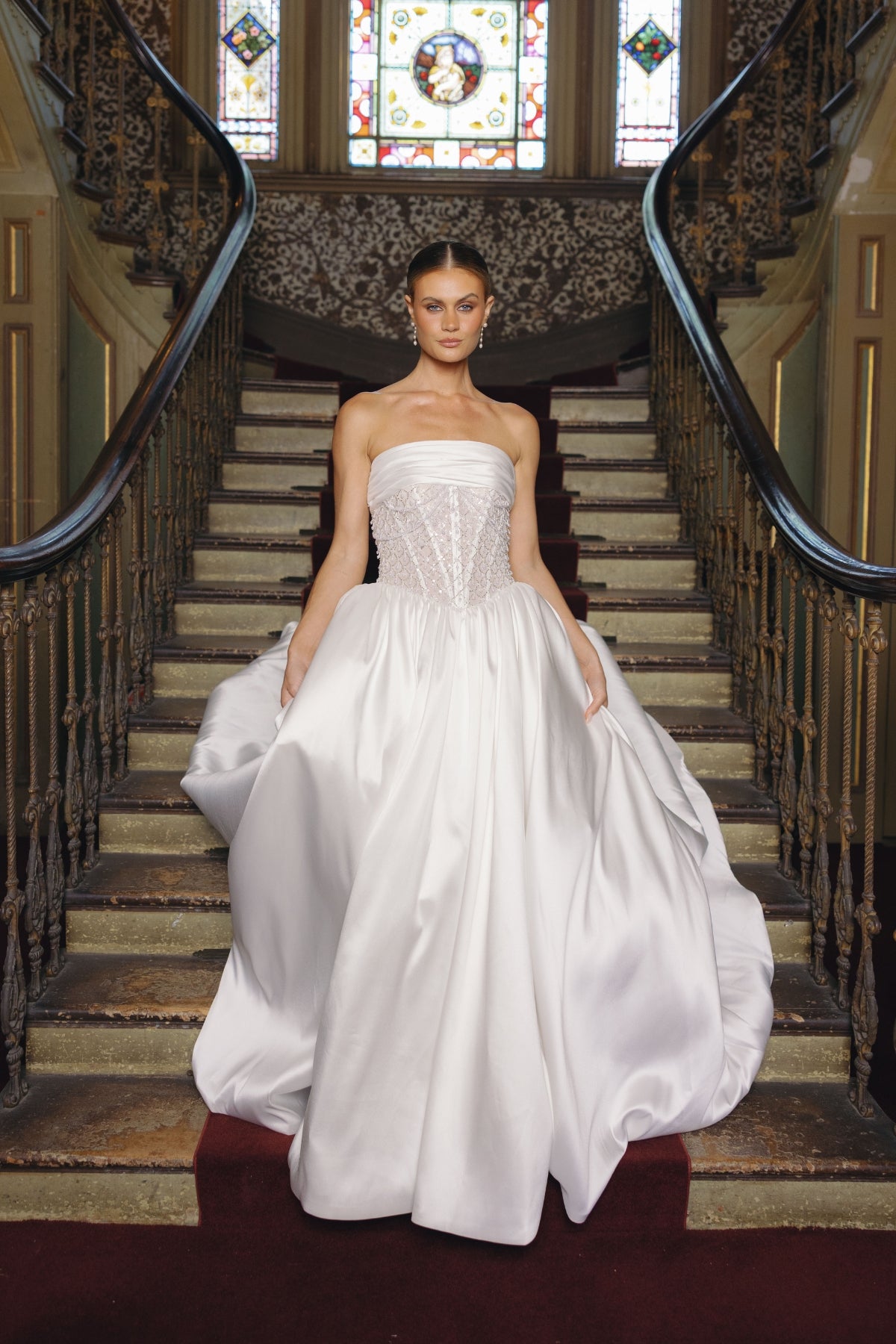 strapless A-line wedding gown with beaded pearl and crystal bodice, mikado fabric. 