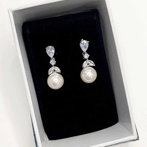 Diamante earrings with round pearl hanging from bottom