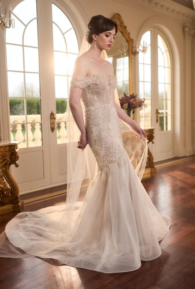Taya dress. Golden mermaid silhouette dress with off-the-shoulder sweetheart neckline. Champagne lining with a layer of glitter tulle and golden lace applique. 
