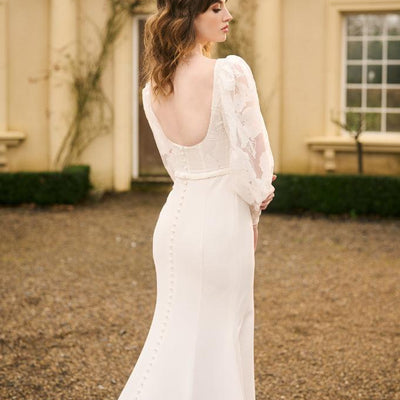 Tamia gown back view. Scoop back with covered buttons that run the length of the train.