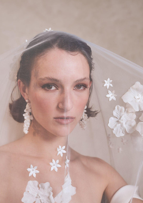 close up of sienna veil. 3D flowers with pearl beads on soft tulle