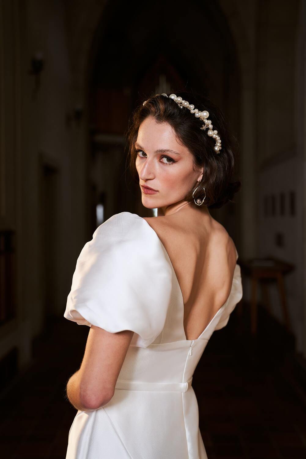 Model wearing Sydney wedding dress with statement sleeves from the Royal collection