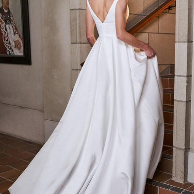 Model wearing Summer wedding dress with a full a-line skirt from the Royal Collection