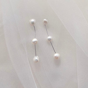 Image of Bella earrings with three freshwater pearls joined by silver chain