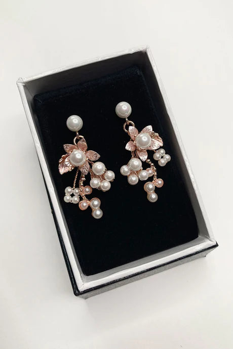Rose Gold pearl encrusted flower earrings in matte finish metal.
